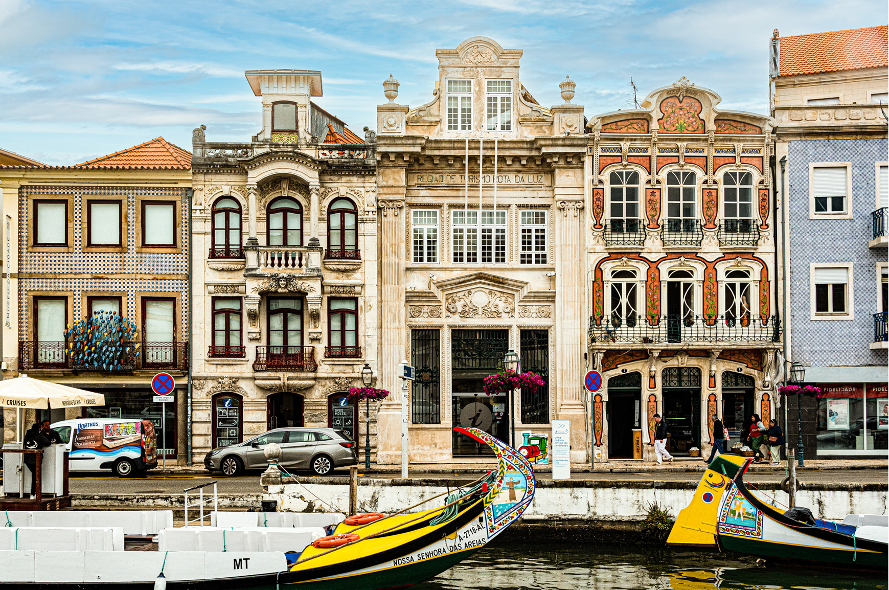 Canals, colorful boats, and Art Nouveau architecture draw visitors to Aveiro