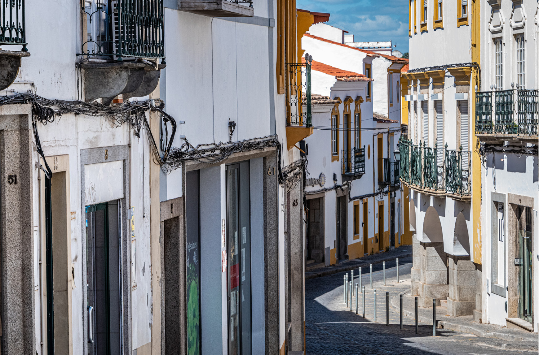 Handsome two to four-story medieval buildings line Évora’s charming and meandering streets