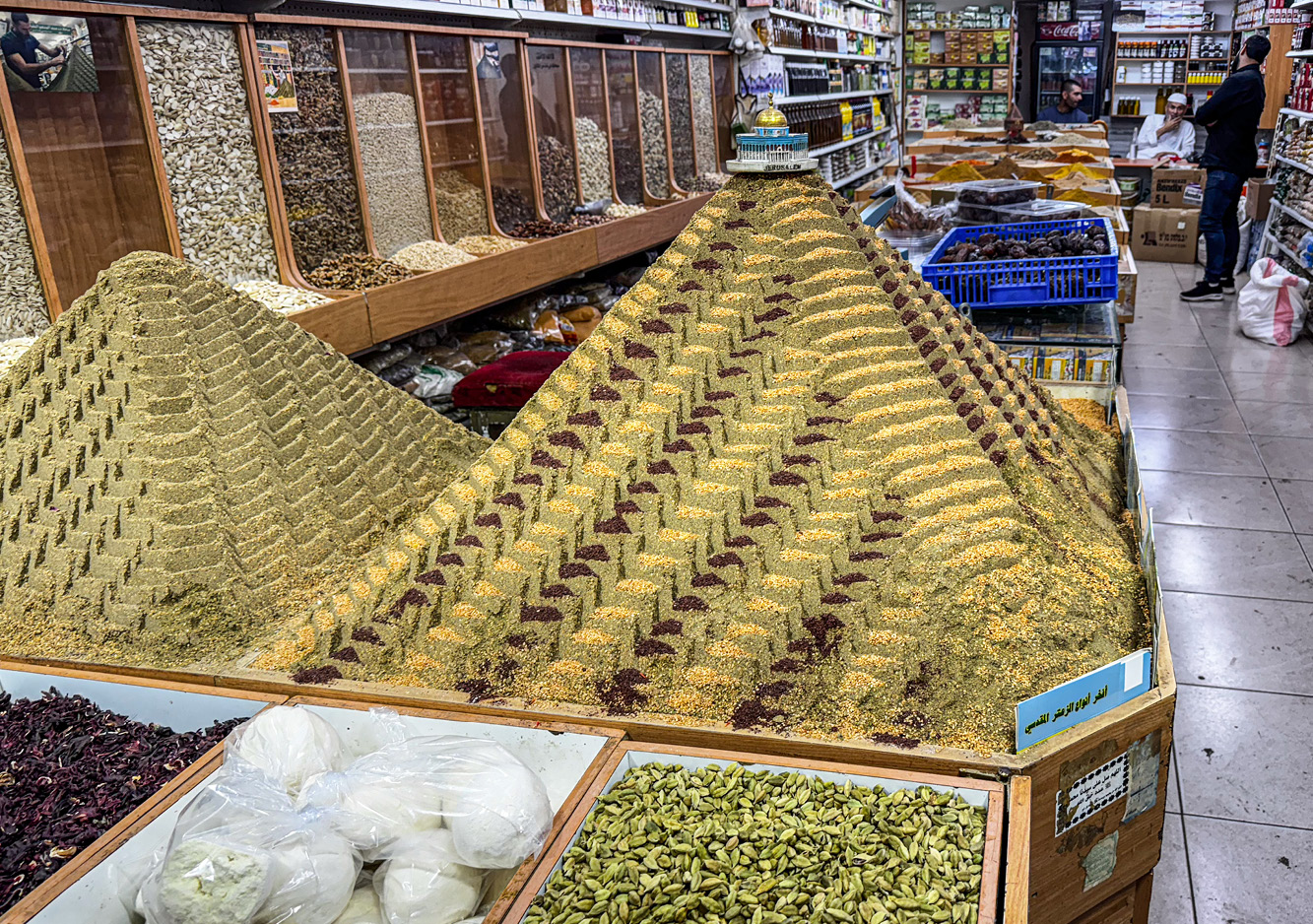 Pyramids of za’atar (thyme, oregano, marjoram sesame, sumac, cumin or coriander are typical ingredients) and other colorful spices greet the buyer at this store in the Muslim Quarter.