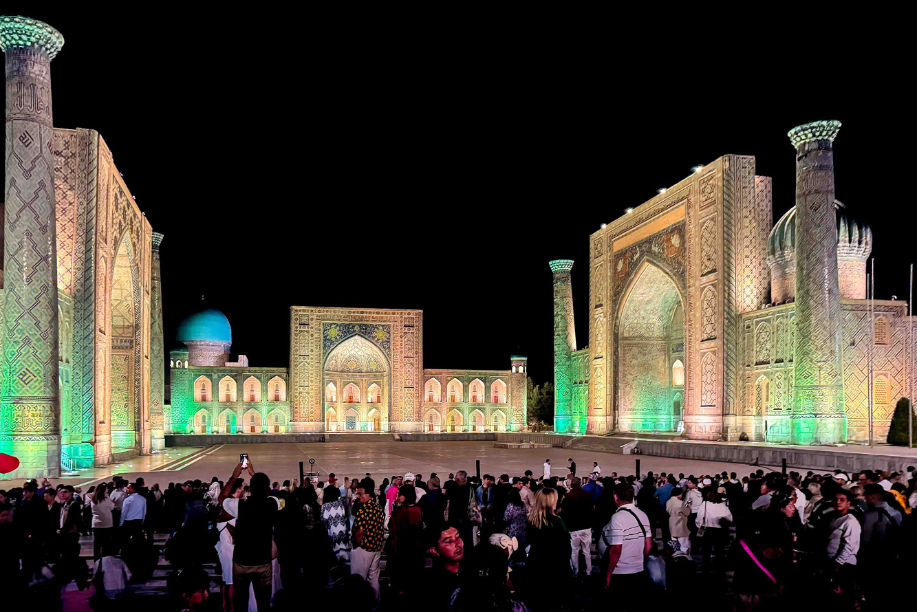Samarkand’s iconic Registan Square glows during an evening light show